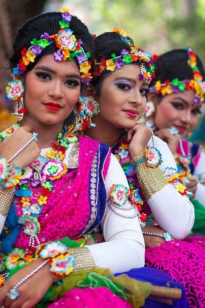 Bangladeshi people pictured wearing traditional attire and jewellery as ...