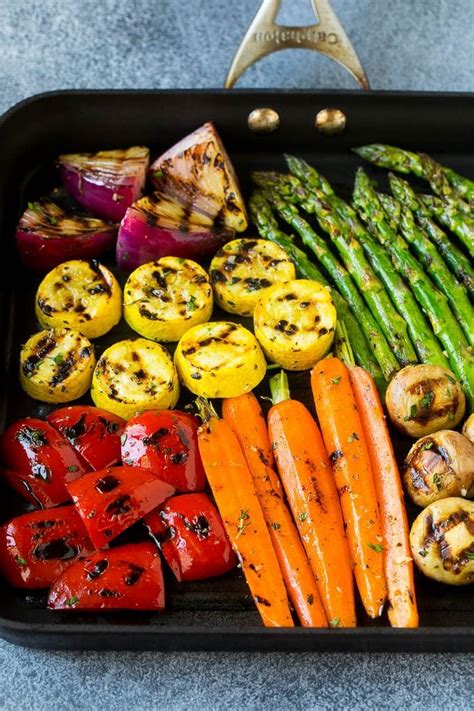 These grilled vegetables are an assortment of colorful veggies bathed in a flavorful garlic and ...