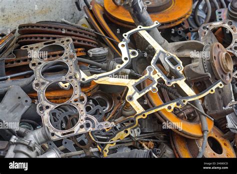 Old car parts scrap metal for recycling Stock Photo - Alamy