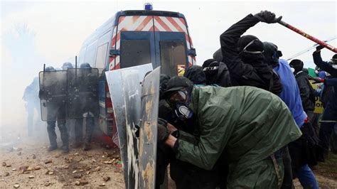 France protests: Demonstrator in critical condition and 16 officers injured as French police ...