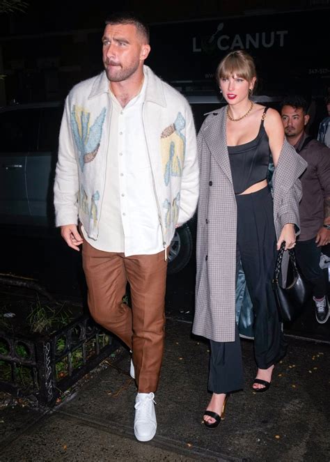 Taylor Swift and Travis Kelce Hold Hands After Surprise ‘SNL’ Cameos ...