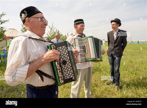 Russian Accordion Player playing music outside Stock Photo - Alamy