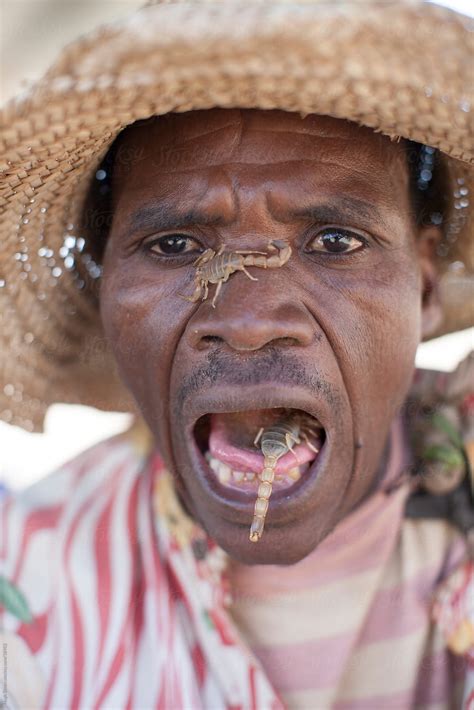 «Salesman With Live Scorpions On His Face» del colaborador de Stocksy ...