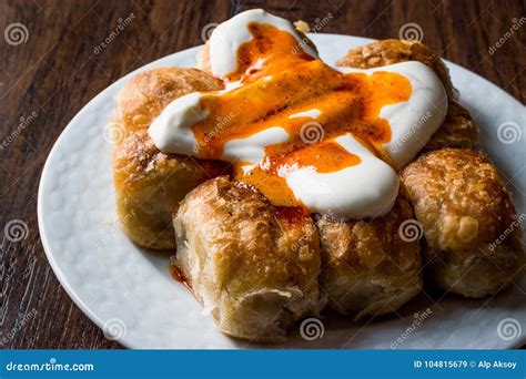 Bosnian Pastry Manti with Yogurt and Fried Butter Sauce / Bosnak Borek Stock Image - Image of ...