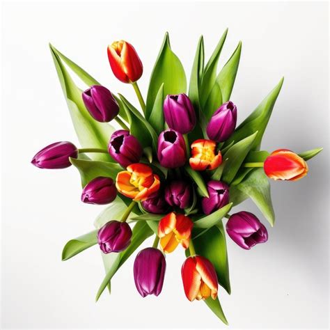 Premium AI Image | A bouquet of purple and orange tulips with green leaves.