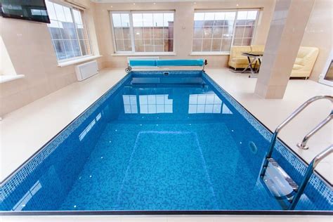 Home Indoor Swimming Pools 101: Cost, Construction, and Prices