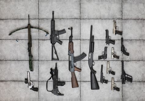 Premium Photo | Arsenal of weapons collection closeup of guns and grips firearms