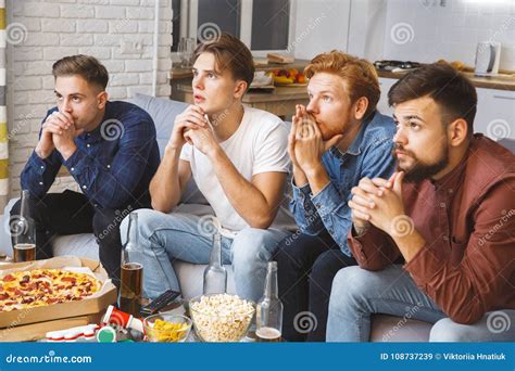 Men Watching Sport on Tv Together at Home Nervous Stock Image - Image ...