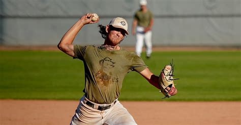 Baseball Player Throwing the Ball · Free Stock Photo