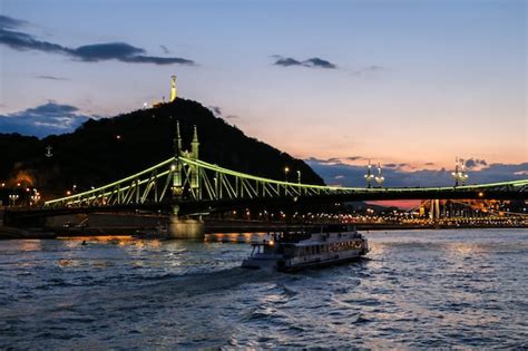 Premium Photo | Evening view of the danube river, bridges, sights of ...