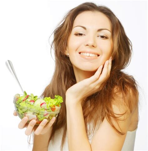 Premium Photo | Girl eating healthy food