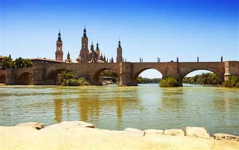 Free Photo | Antique bridge over ebro river in zaragoza