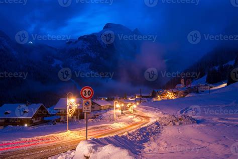 mountain village in alps at night 10683649 Stock Photo at Vecteezy