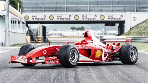 F1: One of Michael Schumacher's Ferraris has sold for almost $15 million at auction | CNN