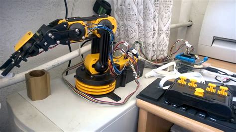 Yet another robotic arm kit (owi535?) controlled by Raspberry Pi ...