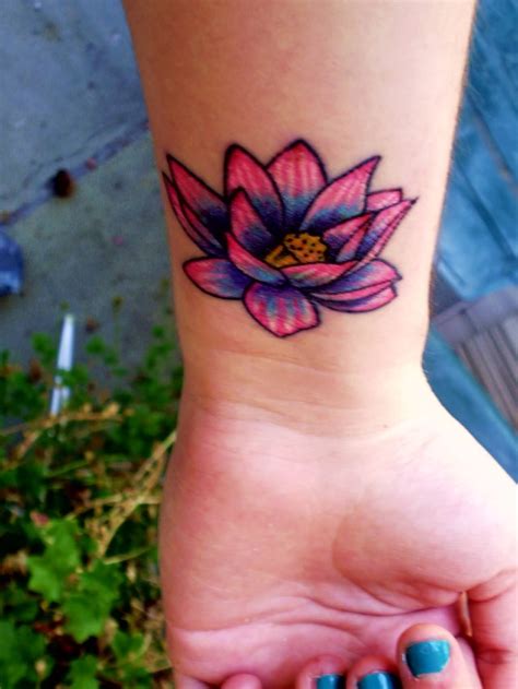 Lotus Flower Wrist Tattoo Idea For Girls