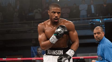 The black Grant boxing gloves worn by Adonis Johnson (Michael B. Jordan) in the movie Creed: The ...