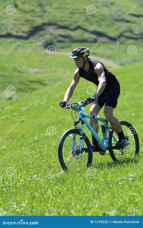 Biker on green race stock image. Image of cycle, green - 1379233