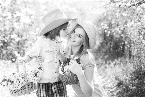 Premium Photo | Happy mother family with son at picnic basket with ...