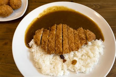 Japanese Style Fried Pork Curry Rice 7950047 Stock Photo at Vecteezy