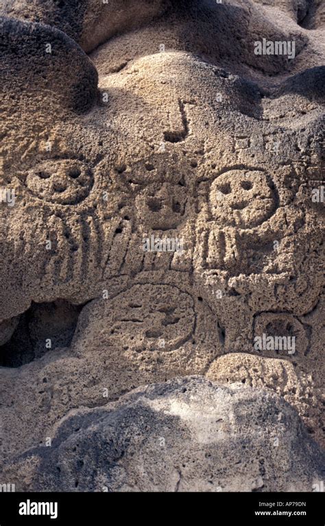 Taino Indian petroglyphs in a shallow cave on cliffs overlooking Lake Enriquillo in the ...