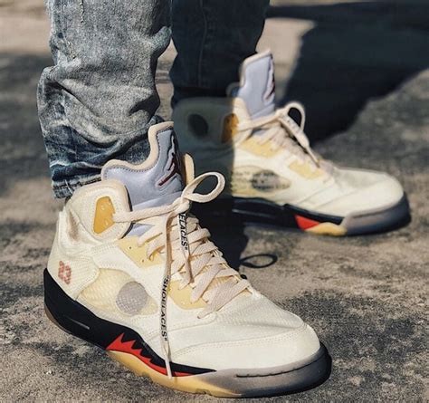 Here's Your Best On-Foot Look at the Off-White™ x Air Jordan 5 "Sail" - KLEKT Blog