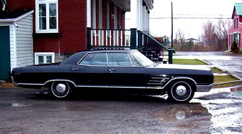 IMCDb.org: 1966 Buick LeSabre Four-Door Sedan in "John Cougar Mellencamp: Pink Houses, 1983"