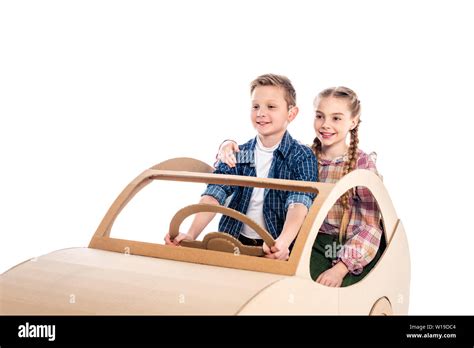 happy kids sitting and playing with cardboard car Isolated On White ...