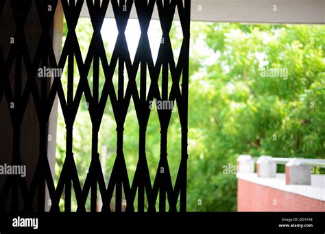 Black Metal grille sliding Door Stock Photo - Alamy