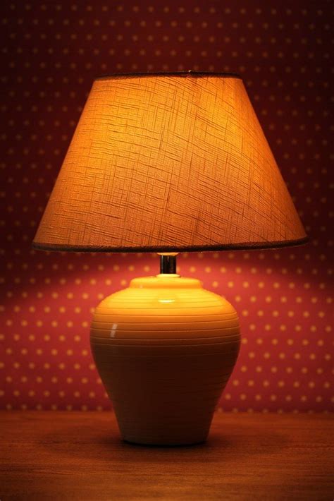 Table lamp on wallpaper background #furnituredesign | Furniture design ...