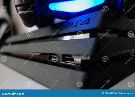 Sony Black Playstation 4 Pro Game Console and Blue Wireless Controller Editorial Image - Image ...