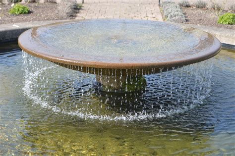 Pond fountain | Pond fountains, Bird bath, Water features