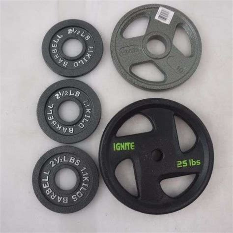 Assortment Of Weight Plates: Ignite 25lb Standard Weight Plate, Weider ...