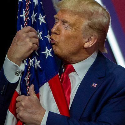 Watch Trump Fondle an American Flag at CPAC