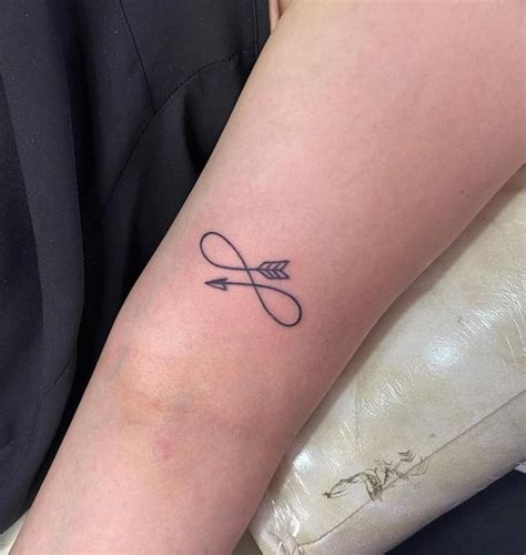 Infinity Arrow Tattoo 2 | Infinity tattoos, Infinity tattoo designs, Infinity arrow tattoo