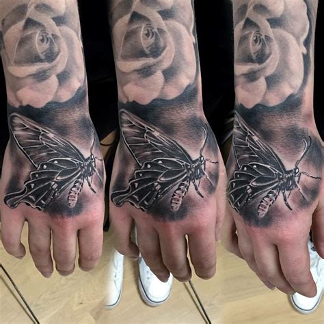 Moth and Rose Hand Tattoo ~ z Tattoo Geek - Ideas for best tattoos