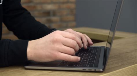 Close up of hands typing on laptop computer 12069376 Stock Video at Vecteezy