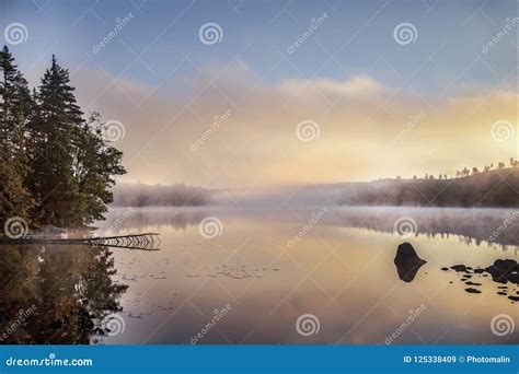 Foggy Morning Sunrise by the Lake Stock Image - Image of sunshine, morning: 125338409