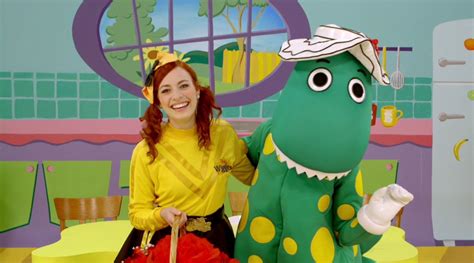 Emma with Dorothy the Dinosaur!💚💛