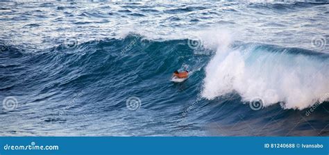 Surfing at Ho`okipa editorial stock photo. Image of beach - 81240688