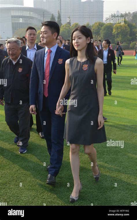 Richard Liu Qiangdong, left, Chairman and CEO of JD.com, and his wife Zhang Zetian, also known ...