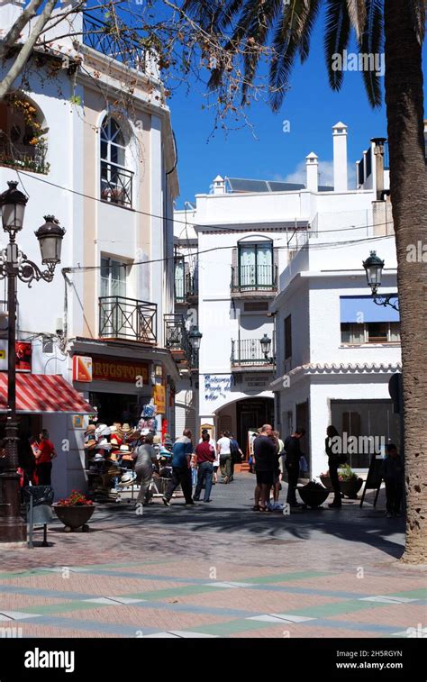 Tourist shopping street in the old town, Nerja, Spain Stock Photo - Alamy