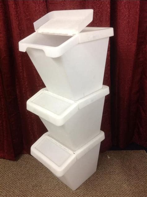 Lot Detail - THREE PLASTIC STACKABLE STORAGE BINS