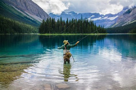 Fly fishing Lake Louise. Photo by Andy Best/Travel Alberta | Banff national park, Fishing ...