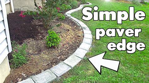 Simple DIY paver stone edge and manual grading near foundation - YouTube