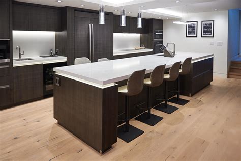 Dark kitchen along one wall in minimalist style in Toronto