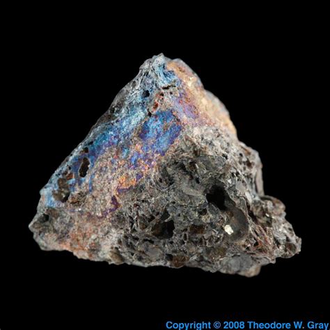 Rough titanium metal in slag, a sample of the element Titanium in the Periodic Table