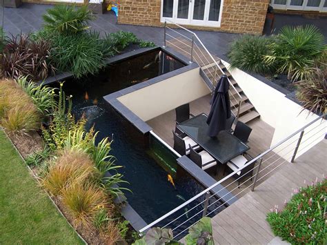 35 Sublime Koi Pond Designs and Water Garden Ideas for Modern Homes