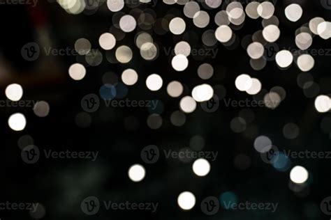 White bokeh background of Christmas lights and New year 10713427 Stock Photo at Vecteezy