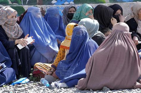 The Taliban says women in Afghanistan must wear head-to-toe clothing in ...